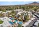 Beautiful aerial view of condominium complex, pool, parking, and mountain backdrop at 5124 N 31St Pl # 514, Phoenix, AZ 85016