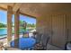 Enjoy stunning water views from this outdoor patio with a table and chairs, perfect for dining and relaxation at 5124 N 31St Pl # 514, Phoenix, AZ 85016
