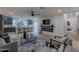 Open-concept living room and kitchen featuring modern furnishings and stylish decor at 5525 E Waltann Ln, Scottsdale, AZ 85254