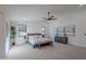 Bright main bedroom with windows, modern art, and a well-appointed bed at 5525 E Waltann Ln, Scottsdale, AZ 85254