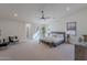 Spacious main bedroom with a large bed, seating, and neutral tones throughout at 5525 E Waltann Ln, Scottsdale, AZ 85254