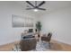 Clean office space featuring a modern desk setup, a leafy plant, and neutral decor at 5525 E Waltann Ln, Scottsdale, AZ 85254