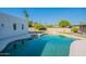 Backyard pool with spacious deck, seamlessly blending indoor and outdoor living at 5525 E Waltann Ln, Scottsdale, AZ 85254