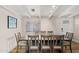 Dining room with dining table and chairs, beams on the ceiling, and neutral colors at 5833 N 10Th St, Phoenix, AZ 85014