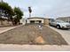 Shot of small one-story home featuring a mailbox and well maintained walkway at 639 S 92Nd Pl, Mesa, AZ 85208