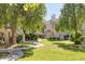 Lush green community space with walkways, manicured landscaping, and inviting outdoor environment at 6885 E Cochise Rd # 129, Paradise Valley, AZ 85253