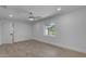 Bedroom featuring modern flooring, a ceiling fan, recessed lighting, and a window with bright, natural light at 701 W Windsor Ave, Phoenix, AZ 85007