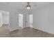 Bedroom featuring modern flooring, a ceiling fan, recessed lighting, and an open doorway to the bathroom at 701 W Windsor Ave, Phoenix, AZ 85007