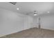 Bedroom featuring modern flooring, a ceiling fan, recessed lighting, closet and bathroom doors at 701 W Windsor Ave, Phoenix, AZ 85007