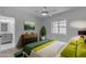 Sunlit bedroom with stylish decor, wood floors, and a serene atmosphere at 701 W Windsor Ave, Phoenix, AZ 85007