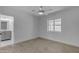 This bright bedroom offers wood-look floors and an attached bathroom, adding convenience and modern appeal at 701 W Windsor Ave, Phoenix, AZ 85007