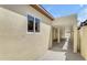 Extended carport with concrete slab and direct home access at 701 W Windsor Ave, Phoenix, AZ 85007
