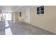 Carport with concrete slab floor and direct home access at 701 W Windsor Ave, Phoenix, AZ 85007