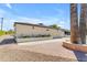 Beige home with mature landscaping, paver and concrete driveway at 701 W Windsor Ave, Phoenix, AZ 85007