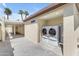 Exterior view of carport, laundry, and hot water heater at 701 W Windsor Ave, Phoenix, AZ 85007