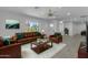 Cozy living room featuring leather furniture, a fireplace, and an area rug at 701 W Windsor Ave, Phoenix, AZ 85007