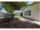 Exterior shot of the home surrounded by low-maintenance desert landscaping at 7126 W Ocotillo Rd, Glendale, AZ 85303