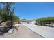 Charming single-story home featuring a three-car garage, neutral paint and desert landscaping at 7126 W Ocotillo Rd, Glendale, AZ 85303