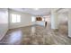 Bright living room with open layout, tile floors, and view into the kitchen at 7126 W Ocotillo Rd, Glendale, AZ 85303