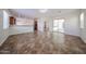 Open concept view of living room, kitchen and dining area, featuring tile floors throughout at 7126 W Ocotillo Rd, Glendale, AZ 85303