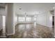 Open living room with neutral walls, tile flooring, and recessed lighting at 7126 W Ocotillo Rd, Glendale, AZ 85303