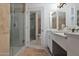 This bathroom features a glass enclosed shower and a double sink vanity at 7137 E Rancho Vista Dr # 3007, Scottsdale, AZ 85251
