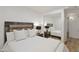 Cozy bedroom with mirrored closet doors, stylish furniture, and a comfortable bed with soft lighting at 7137 E Rancho Vista Dr # 3007, Scottsdale, AZ 85251