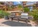 Outdoor kitchen with stainless steel BBQ grills, counter space, and a durable black mat at 7137 E Rancho Vista Dr # 3007, Scottsdale, AZ 85251