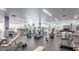 Modern gym with state-of-the-art exercise equipment, weights, and large windows for natural light at 7137 E Rancho Vista Dr # 3007, Scottsdale, AZ 85251