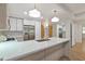 Modern kitchen featuring an island with stone countertops, stainless steel appliances, and ample cabinet space at 7137 E Rancho Vista Dr # 3007, Scottsdale, AZ 85251