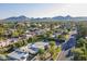 Residential neighborhood with mountain views, lush landscaping, and nearby lake at 7471 E Northern Ave, Scottsdale, AZ 85258
