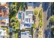 Bird's eye view of the home, highlighting the pool, solar panels, and expertly designed landscaping at 7471 E Northern Ave, Scottsdale, AZ 85258