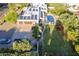 Aerial view highlighting the backyard pool, playground, and solar panels on the home's roof at 7471 E Northern Ave, Scottsdale, AZ 85258