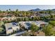 Stunning aerial view of the house showcasing its architecture, landscaping, and surrounding neighborhood at 7471 E Northern Ave, Scottsdale, AZ 85258
