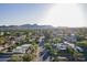 Scenic neighborhood view with tree-lined streets and mountain backdrop at 7471 E Northern Ave, Scottsdale, AZ 85258