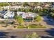 Aerial view of estate featuring a charming Spanish style, with meticulous landscaping and red tile roof at 7471 E Northern Ave, Scottsdale, AZ 85258