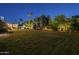Beautiful backyard with play structure and view of the covered patio at 7471 E Northern Ave, Scottsdale, AZ 85258