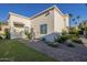 Exterior view with healthy green lawn and a brick walkway leading to the home at 7471 E Northern Ave, Scottsdale, AZ 85258