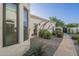 Exterior showcasing a well-manicured yard, stylish plants and a charming home design at 7471 E Northern Ave, Scottsdale, AZ 85258