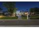 Stunning desert home with charming walkway, mature trees and flowering plants at 7471 E Northern Ave, Scottsdale, AZ 85258