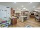 Spacious open kitchen with stainless steel appliances, large island, and skylights for natural light at 7471 E Northern Ave, Scottsdale, AZ 85258
