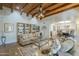 Bright and airy living room with hardwood floors, exposed wood beams, and comfortable seating at 7471 E Northern Ave, Scottsdale, AZ 85258
