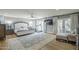 Expansive main bedroom featuring a ceiling fan, and french door access at 7471 E Northern Ave, Scottsdale, AZ 85258
