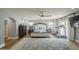 Spacious main bedroom with a ceiling fan, treadmill, and access to outdoor light at 7471 E Northern Ave, Scottsdale, AZ 85258
