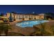 Beautiful backyard featuring a pool, patio, dining, lounge, and covered areas at 7471 E Northern Ave, Scottsdale, AZ 85258