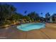 Inviting backyard pool with lush landscaping and lounge areas at 7471 E Northern Ave, Scottsdale, AZ 85258