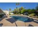 Lush backyard with private swimming pool and manicured landscape at 7471 E Northern Ave, Scottsdale, AZ 85258