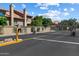 Gated community entrance providing security and privacy with well-maintained landscaping at 7760 E Pepper Tree Ln, Scottsdale, AZ 85250