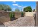 An enclosed patio with brick floor and planters at 7760 E Pepper Tree Ln, Scottsdale, AZ 85250