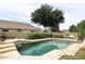 Spacious pool and backyard, perfect for outdoor entertainment and relaxation at 8341 W Gross Ave, Tolleson, AZ 85353